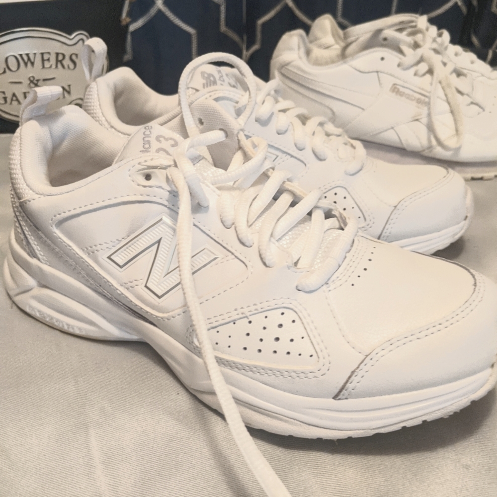 Women's all white New Balance tennis shoes
